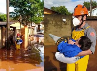 Vídeo mostra bombeiro carregando morador com deficiência em meio à enchente